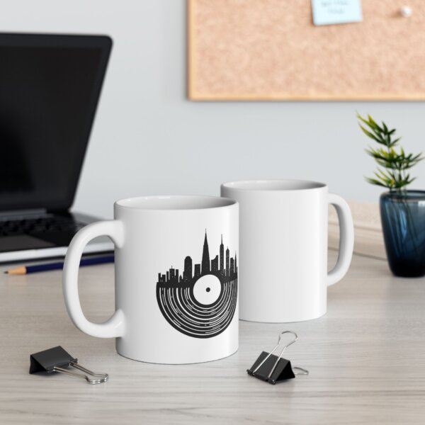 Urban Elegance Ceramic Mug - Cityscape & Vinyl Records Design - Image 4